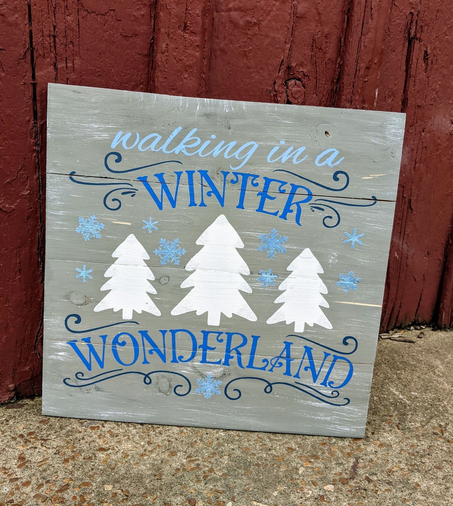 walking in a winter wonderland with trees and snowflakes