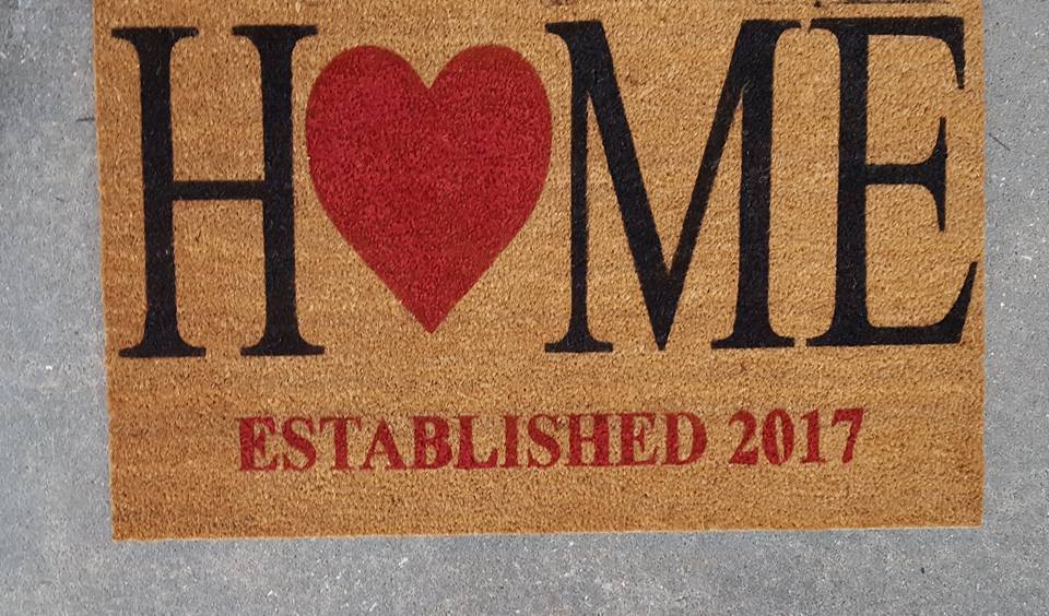 H♥me with established date at the bottom