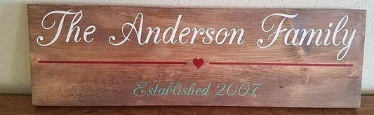 Family last name with line and heart est