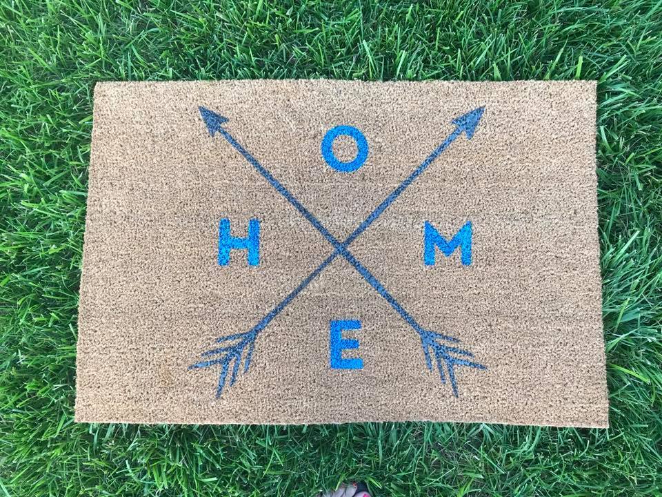 HOME with crossing arrows