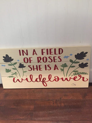 In a field of roses she is a wildflower | Poster