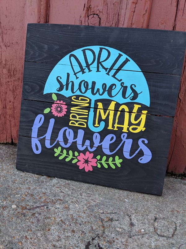 April Showers bring may flowers with umbrella