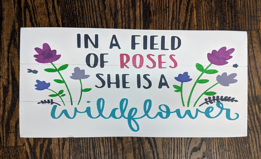 In a field of roses she is a wildflower