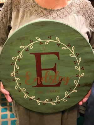 Family name with Initial EST with wreath (last name with tails)