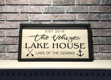 Lake house with family name and est date