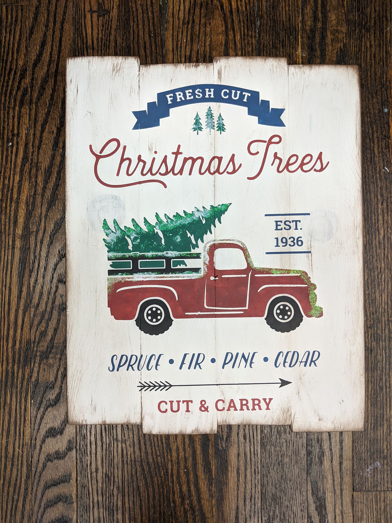 Fresh cut Christmas trees with truck