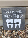Bringing teeth together