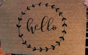 hello with leafy wreath