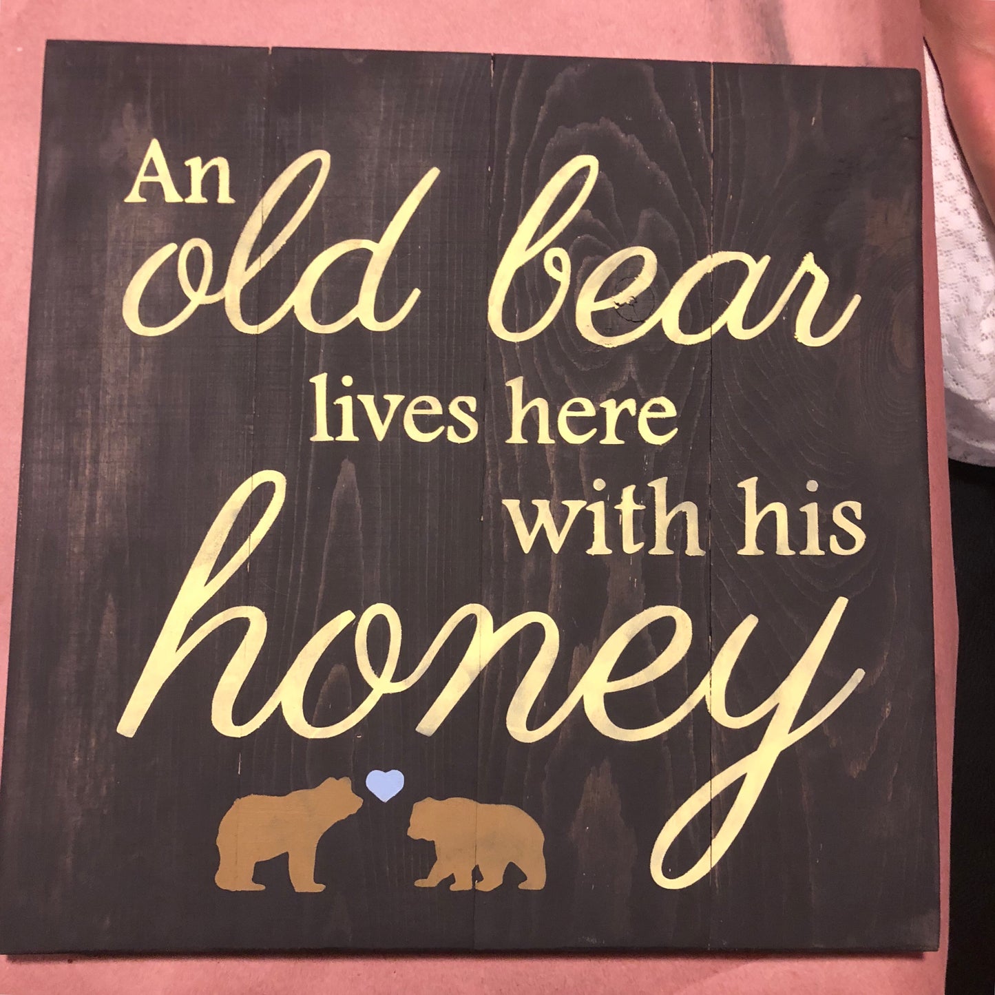 An old bear lives with his honey