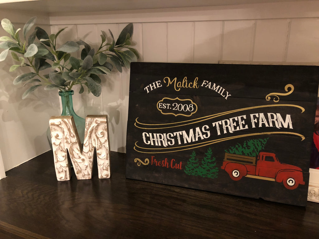 Christmas tree farm with truck family name and est date
