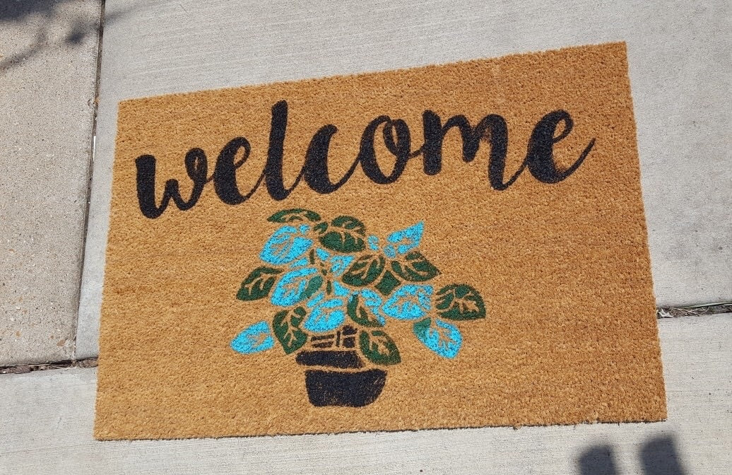 Welcome with plant