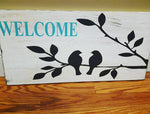 Welcome bird on branches